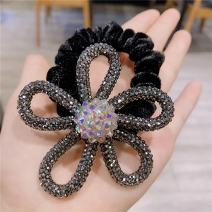 Elegant floral velvet hair tie with sparkling grey rhinestones and rainbow crystal center