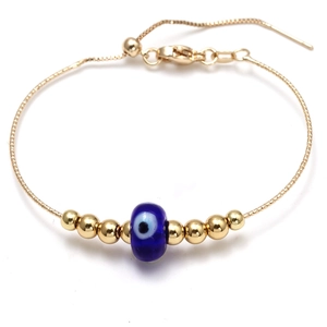 Adjustable golden evil eye bracelet with blue bead and polished beads on snake chain