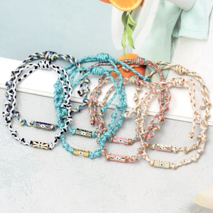 Handmade woven evil eye bracelet with hexagonal beads and adjustable cord for men and women