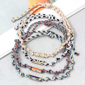 Handmade woven Evil Eye bracelets with hexagonal enamel beads in four various colors