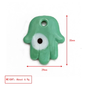 Hamsa Hand Boze Oog hanger van lichtgroen glas met afmetingen 35mm bij 29mm