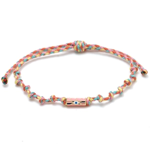 Detailed shot of multi-color woven bracelet with a pink enamel Evil Eye hexagonal bead