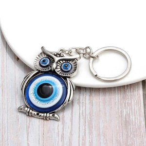 Blue Evil Eye owl keychain accessory with silver metal ring and decorative glass bead