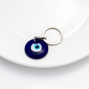 Classic Turkish blue evil eye glass keychain with a polished silver metal ring