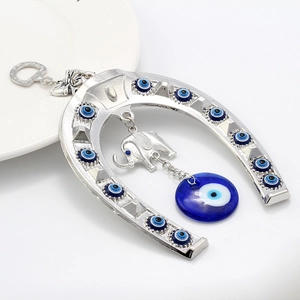 Silver evil eye horseshoe and elephant wall hanging decor for home protection and luck
