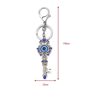 Detail view of evil eye keychain showing dimensions 145mm by 32mm on white background