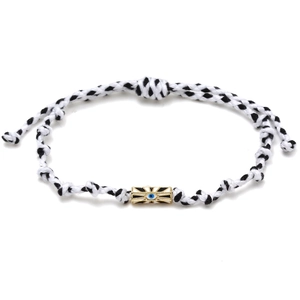 Detailed view of woven Evil Eye bracelet with a gold bead and adjustable closure