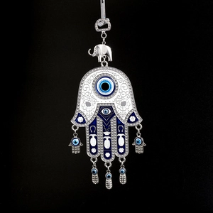 Turkish Evil Eye Hamsa Hand wall hanging with silver elephant and blue enamel charms