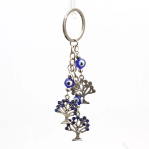 Evil eye and tree of life keychain with blue beads and rhinestones on silver metal