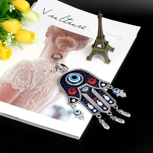 Hamsa Hand and Evil Eye wall hanging with blue and red enamel for home or car decor