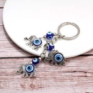 Porte-clés Vintage Mauvais Œil Éléphant Argent Alliage de Zinc Perle de Verre Bleue Pendentif Porte-bonheur Ornement de Sac Bijoux