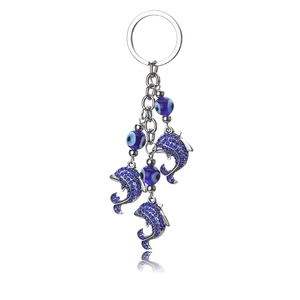 Portachiavi delfino malocchio blu con anello in argento e ciondoli con strass blu