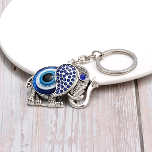 Porte-Clés Éléphant Vintage en Alliage de Zinc Argenté Avec Pendentif Oeil du Mal Strass Bleu Charme de Protection Porte-Clés Cadeau pour Femmes Hommes