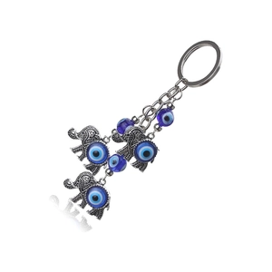 Porte-clés éléphant porte-bonheur Mauvais Œil avec perles bleues et métal argenté