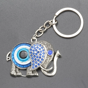 Porte-clés éléphant avec œil porte-bonheur bleu et strass scintillants
