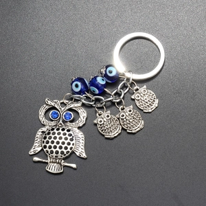 Porte-clés Hibou en Alliage de Zinc Vintage Avec Perles en Verre Mauvais Œil Bleu Pendentif en Strass Amulette Porte-bonheur Voiture Sac