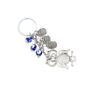 Porte-clés chouette en argent avec perles œil bleu maléfique et plusieurs pendentifs