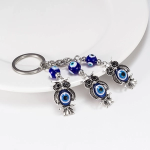 Silver owl keychain with blue evil eye charms for car key or backpack decoration