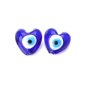 Detailed close-up of heart-shaped blue evil eye beads for handmade jewelry design