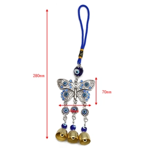 Blue butterfly evil eye wall hanging decor with bells and dimensions of 280mm by 48mm