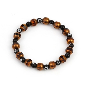 Close-up of the evil eye beaded bracelet with bronze and black textured crystal beads