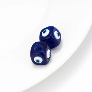 Detail of square blue evil eye glass beads with side holes for DIY jewelry making