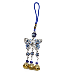 Blue butterfly evil eye wall hanging with alloy accents and small golden bells