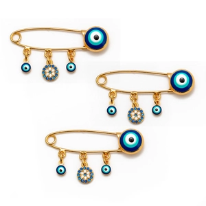 Golden evil eye safety pin brooch set with blue rhinestones and dangling charms