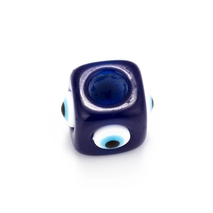 Macro shot of a blue cubic evil eye glass bead for DIY jewelry making and necklaces