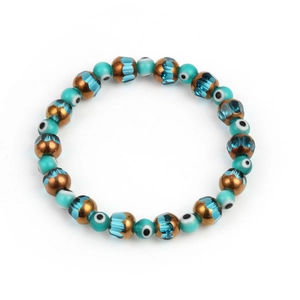 Bohemian Evil Eye beaded charm bracelet with blue crystal accents and elastic band
