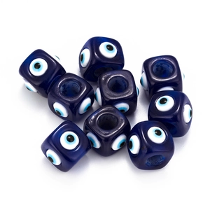 Detailed macro view of cubic dark blue evil eye beads for DIY jewelry making and crafts