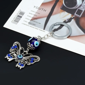 Silver Alloy Butterfly Evil Eye Keychain With Blue Rhinestones Hollow Bag Charm Car Pendant Jewelry For Women