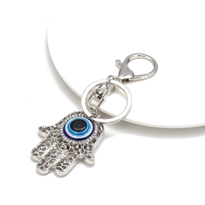 Detail of Hamsa Hand keychain with Evil Eye charm and sparkling rhinestone inlay