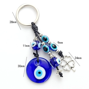 Porte-clés Bohème Mauvais Œil Nazar Turc Perle en Verre Bleue Pendentif Trèfle à Quatre Feuilles en Métal Charme Sac Voiture Ethnique