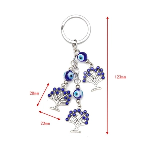 Lucky blue evil eye keychain with silver tree of life pendant and blue rhinestones