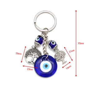 Detailed dimensions of the silver evil eye and tree of life keychain charm