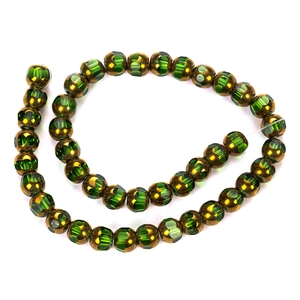 Macro de perles œil de démon en bronze et vert émeraude pour la création de bijoux