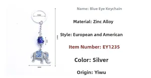 Zinc alloy elephant keychain with blue evil eye bead and silver-tone rhinestones details