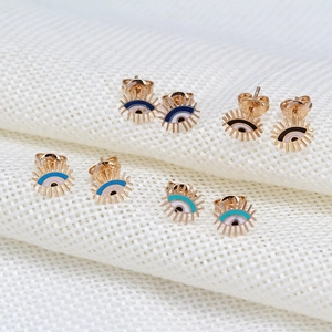 Set of four pairs of evil eye stud earrings in vibrant colored enamel and gold plating
