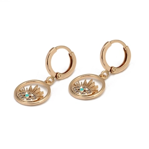 Close-up of golden Evil Eye hoop earrings with turquoise beads and white rhinestones