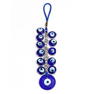 Detail van Hamsa Hand en boze oog wandkleed met 13 blauwe glazen kralen voor decoratie