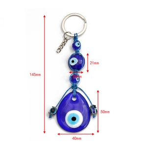 Blauw glazen Evil Eye hangend ornament met gedetailleerde maten op witte achtergrond