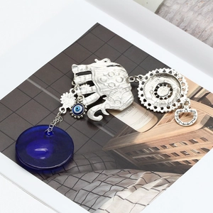 Silver elephant evil eye keychain pendant with deep blue glass charm for luck and protection