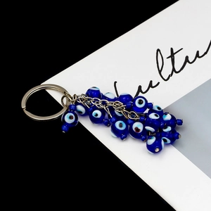 Blue Evil Eye beaded keychain with silver metal ring for car keys and home wall decor