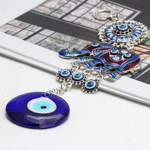 Exotic silver elephant wall decor with blue evil eye glass pendant and colorful enamel