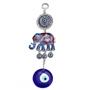 Exotic evil eye elephant keychain with blue glass nazar eye and silver floral charms