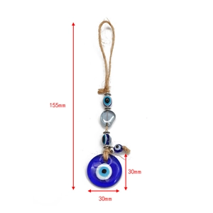 Detail of Turkish Evil Eye glass pendant with rope hanger and 30mm diameter dimensions