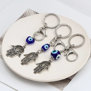 Set di tre portachiavi Mano di Fatima e Malocchio con perline di vetro blu