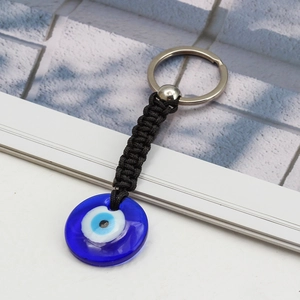 Porte-clés œil bleu turc avec pendentif en verre bleu et cordon noir tressé à la main