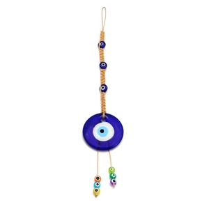Close-up of Turkish Evil Eye wall hanging with colorful glass beads and blue tassel